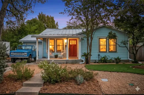 a house view with a garden space