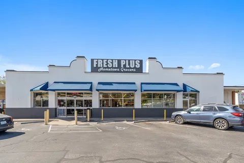 a view of swimming pool with chairs