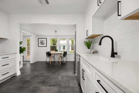 a living room with furniture and window