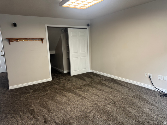 88 Canterbury Lane Logan, UT 84321 - Photo 26 of 37 Neutral-toned walls and plush carpet flooring throughout