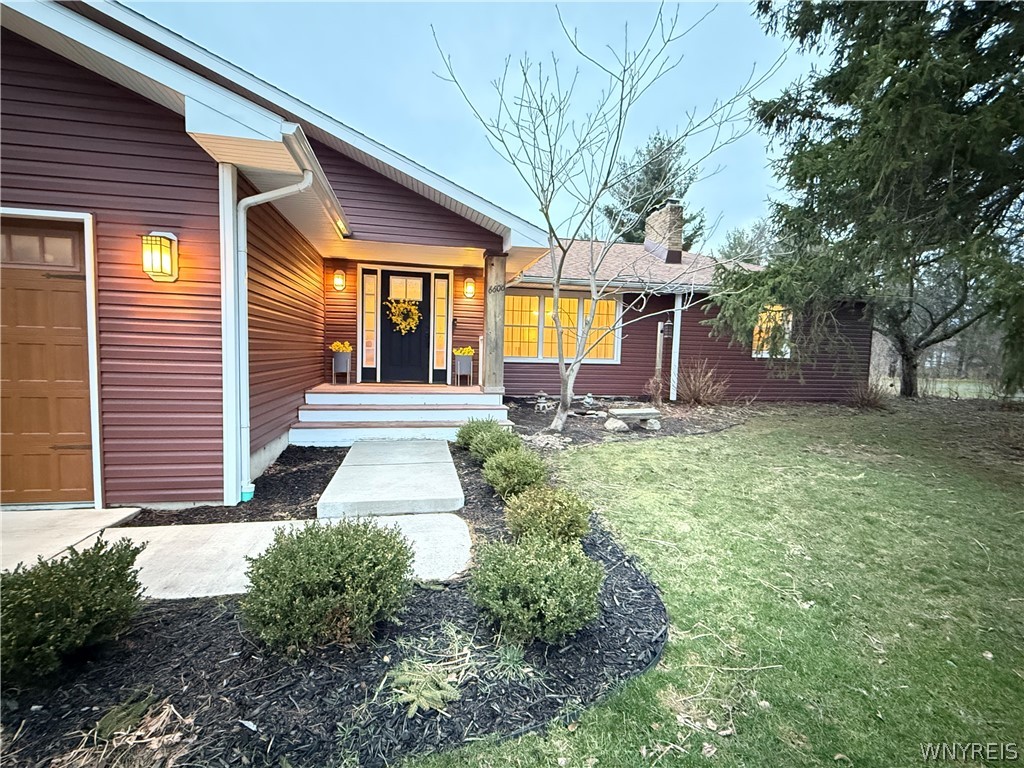 6606 Gartman Road Orchard Park, NY 14127 - Photo 3 of 50 Welcoming Front Porch, with Beautiful Curb Appeal.