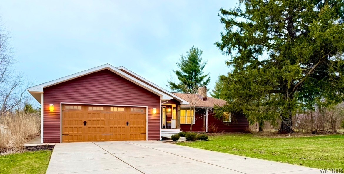 6606 Gartman Road Orchard Park, NY 14127 - Photo 4 of 50 Newer double Concrete Driveway.