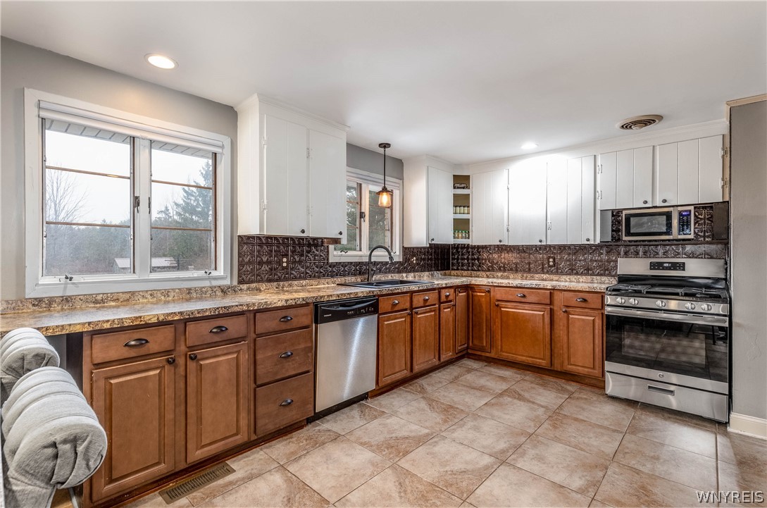 6606 Gartman Road Orchard Park, NY 14127 - Photo 10 of 50 Large kitchen, fully applianced with stainless ste