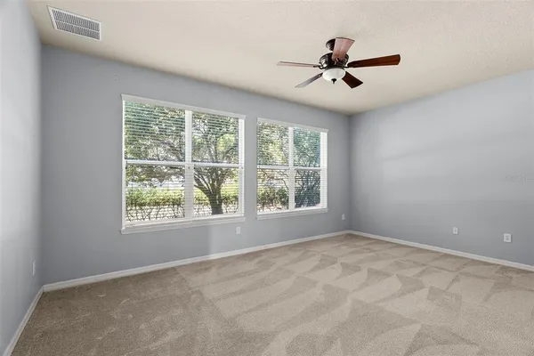 a view of a livingroom with a ceiling fan