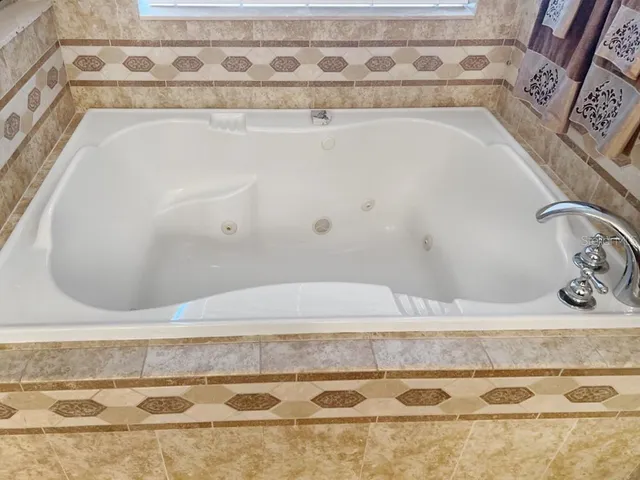 a bathroom with a bathtub