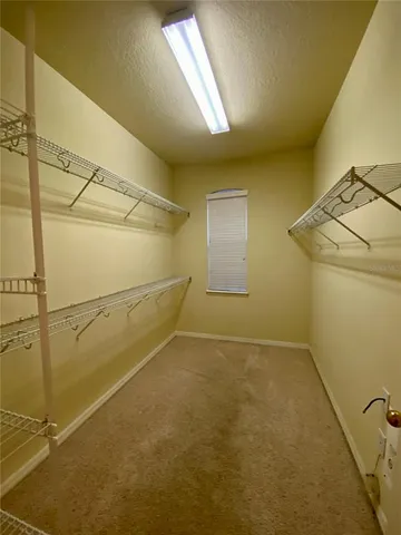 a view of a room with rack and racks on the wall