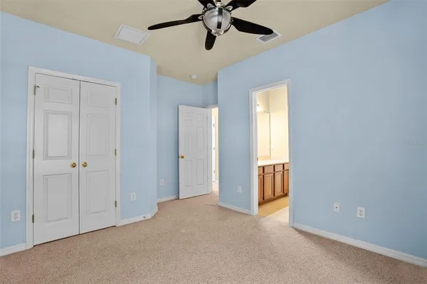 a bathroom with a sink vanity and a mirror