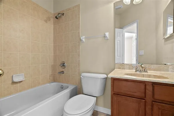 a view of a yard with potted plants