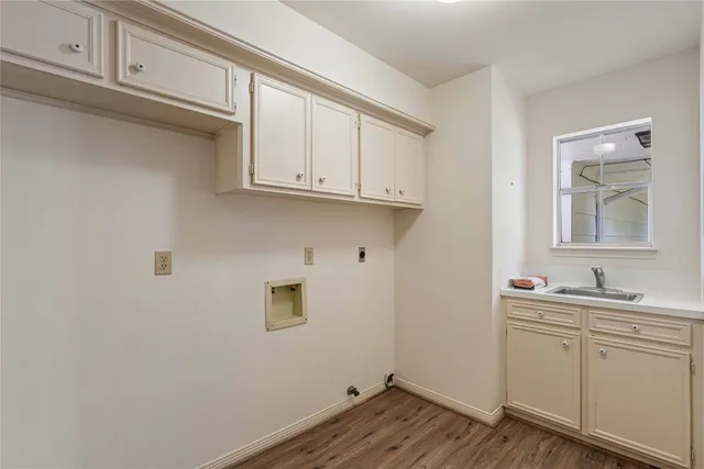 a view of cabinets and wooden floor