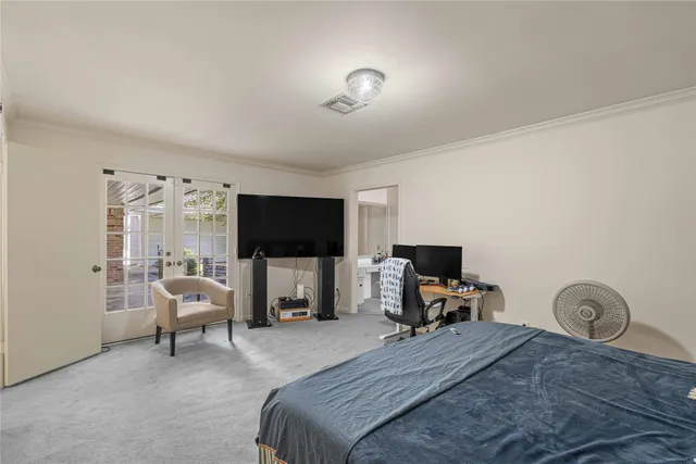 a bedroom with a bed and furniture