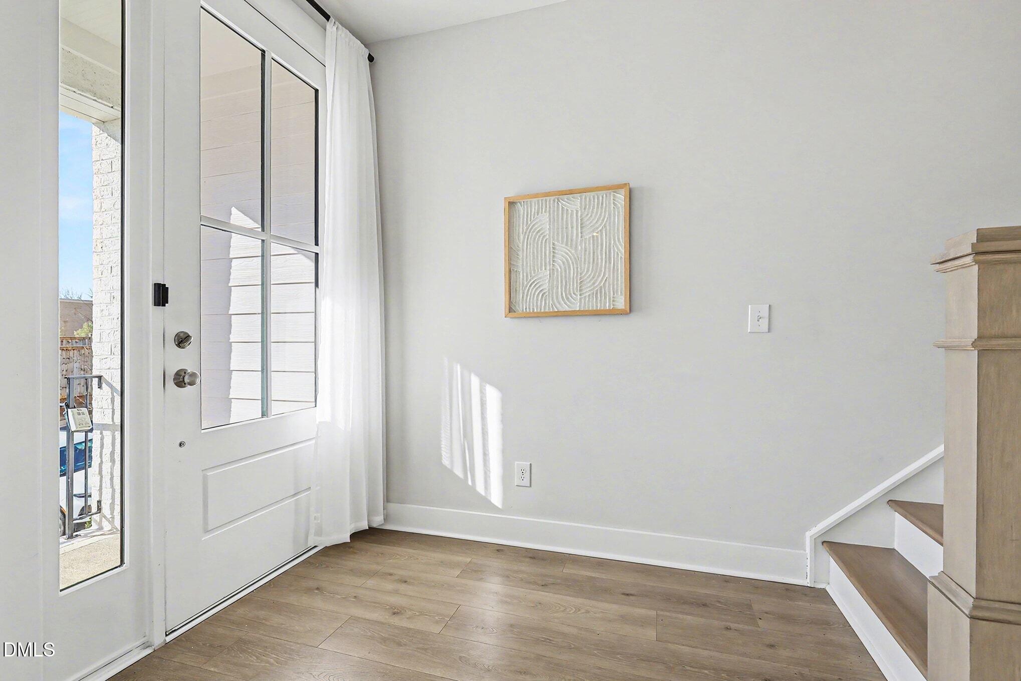 8512 Silsbee Drive Raleigh, NC 27613 - Photo 2 of 42 a view of an empty room and window