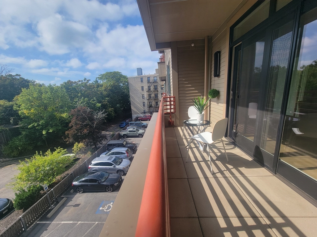 1650 Commonwealth Avenue, Unit 304A Boston, MA 02135 - Photo 13 of 26 a view of a balcony with chairs