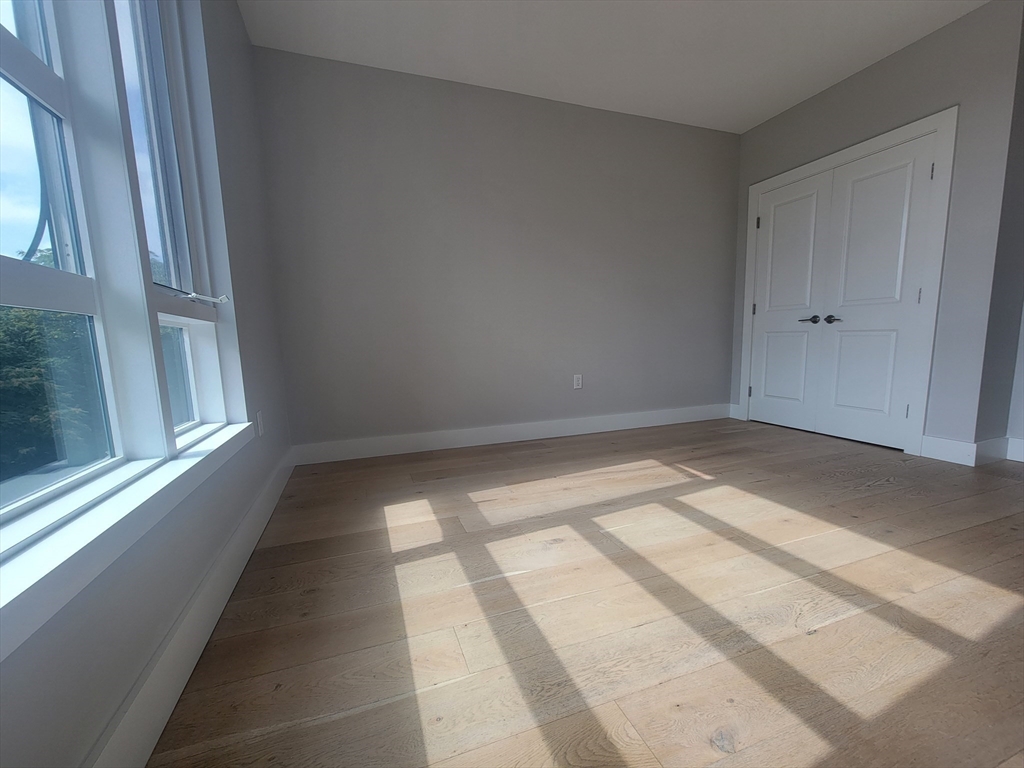 1650 Commonwealth Avenue, Unit 304A Boston, MA 02135 - Photo 16 of 26 a view of room with window