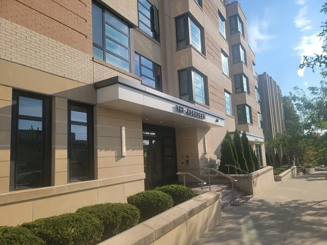 a view of a building with a street