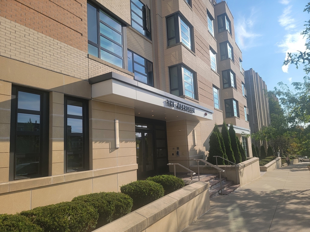 1650 Commonwealth Avenue, Unit 304A Boston, MA 02135 - Photo 2 of 26 a view of a building with a street