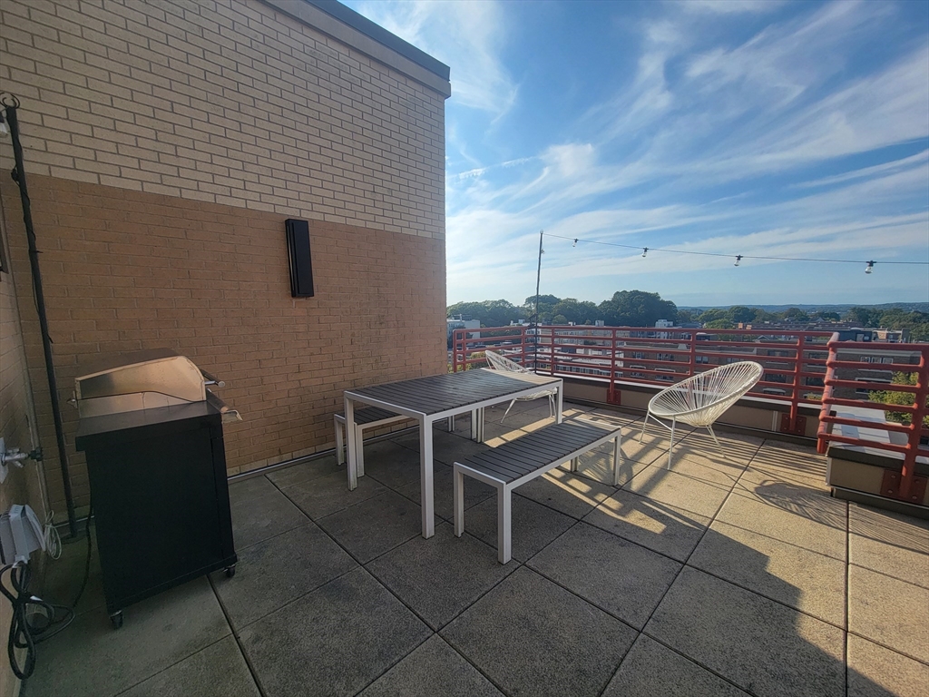 1650 Commonwealth Avenue, Unit 304A Boston, MA 02135 - Photo 24 of 26 a terrace view with sitting space