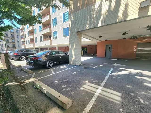 a cars parked on the side of street