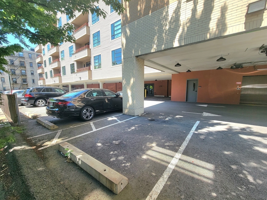 1650 Commonwealth Avenue, Unit 304A Boston, MA 02135 - Photo 25 of 26 a cars parked on the side of street