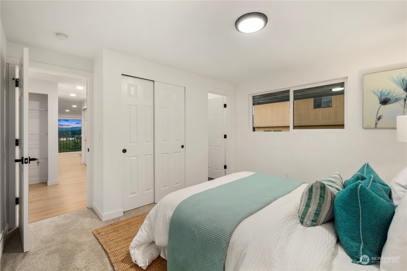 2823 South Bateman Street Seattle, WA 98108 - Photo 18 of 39 a bedroom with a bed and a window