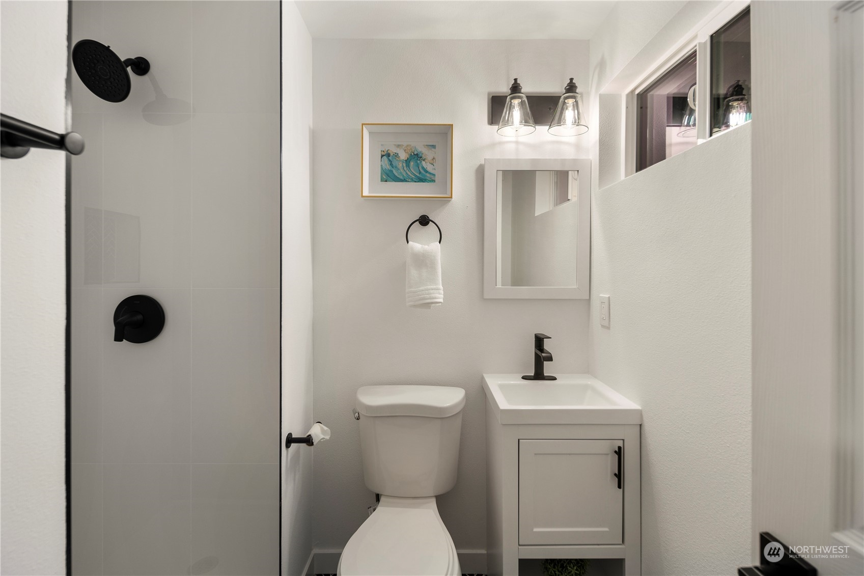 2823 South Bateman Street Seattle, WA 98108 - Photo 20 of 39 a bathroom with a toilet sink and mirror