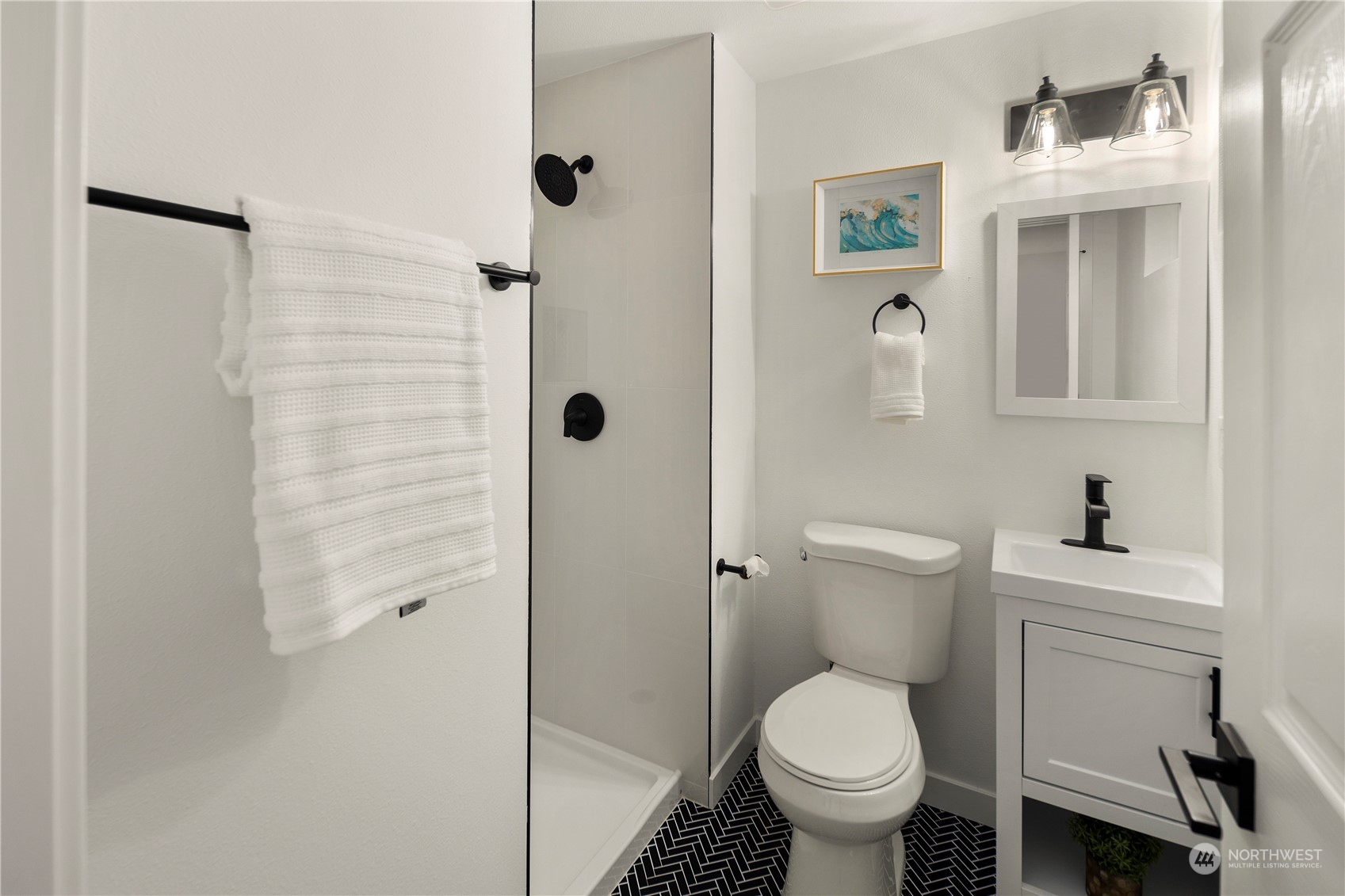 2823 South Bateman Street Seattle, WA 98108 - Photo 21 of 39 a bathroom with a toilet and a sink