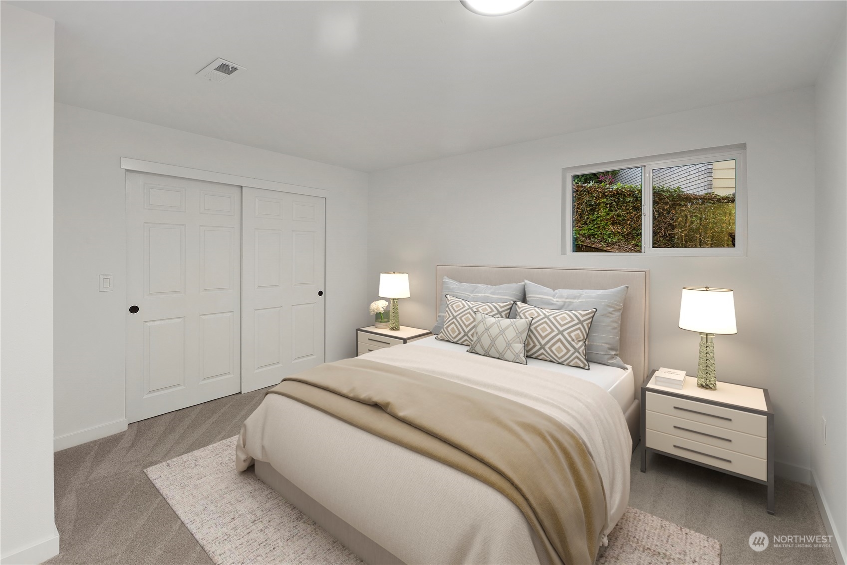 2823 South Bateman Street Seattle, WA 98108 - Photo 23 of 39 a bedroom with a bed and a couch