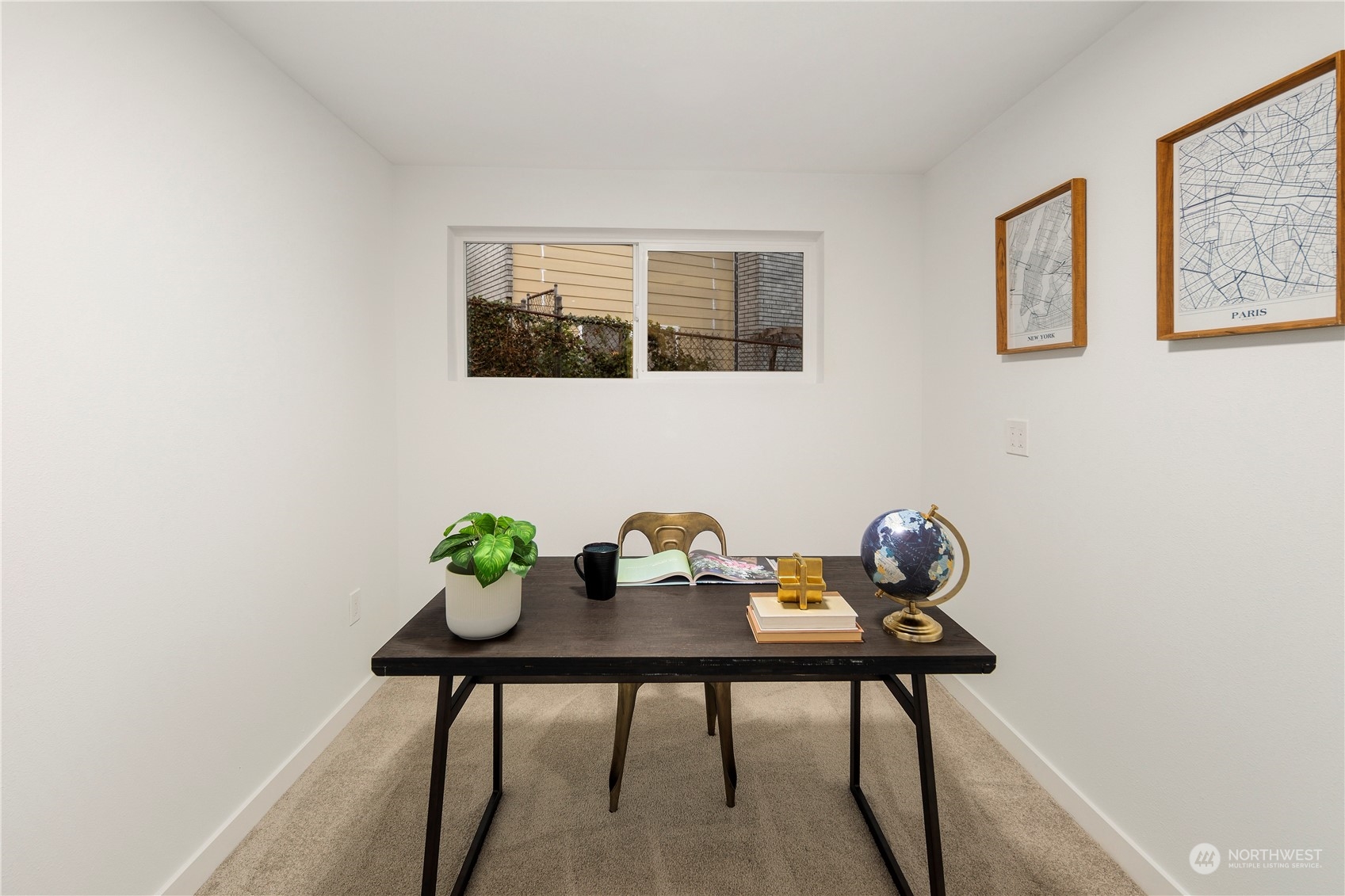 2823 South Bateman Street Seattle, WA 98108 - Photo 25 of 39 a view of a workspace room with furniture and potted plant