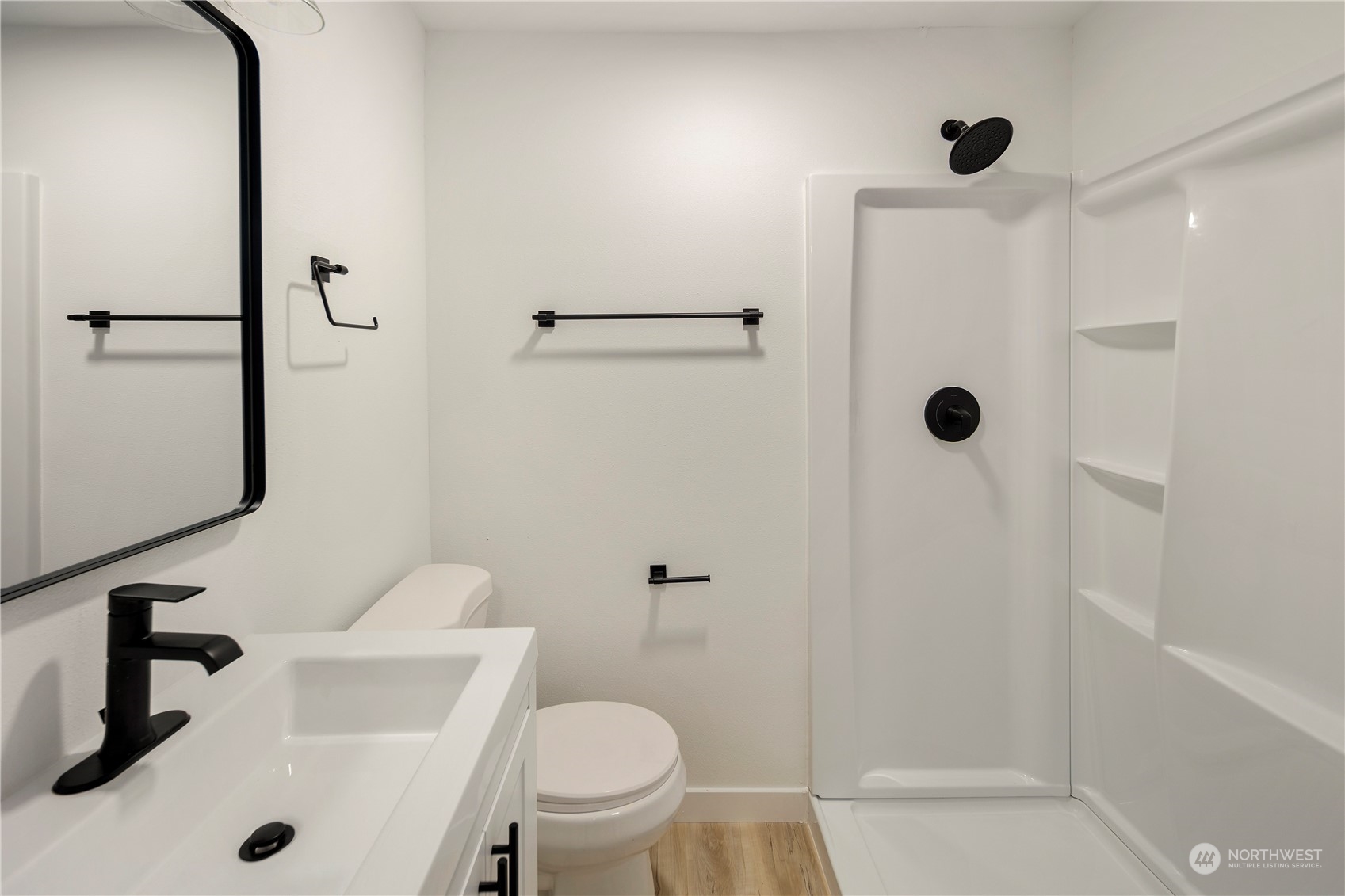 2823 South Bateman Street Seattle, WA 98108 - Photo 27 of 39 a bathroom with a sink toilet and shower