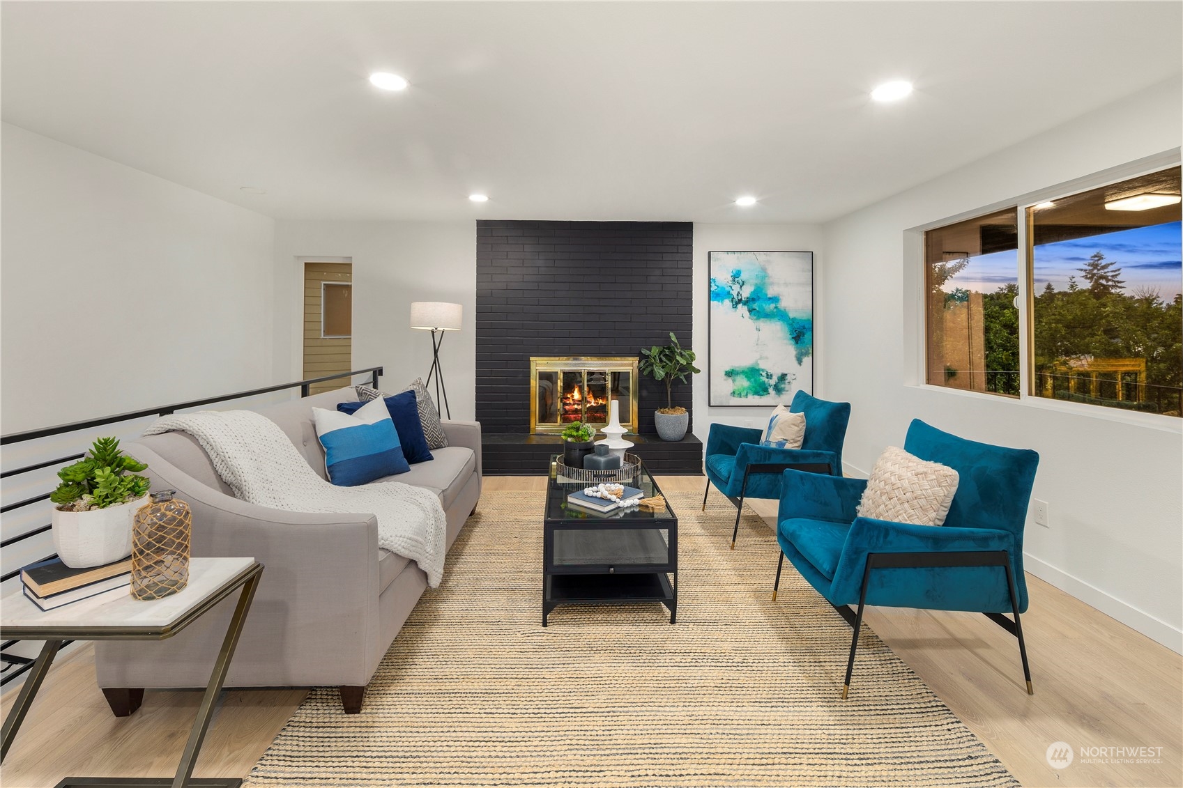 2823 South Bateman Street Seattle, WA 98108 - Photo 5 of 39 a living room with furniture and a wooden floor