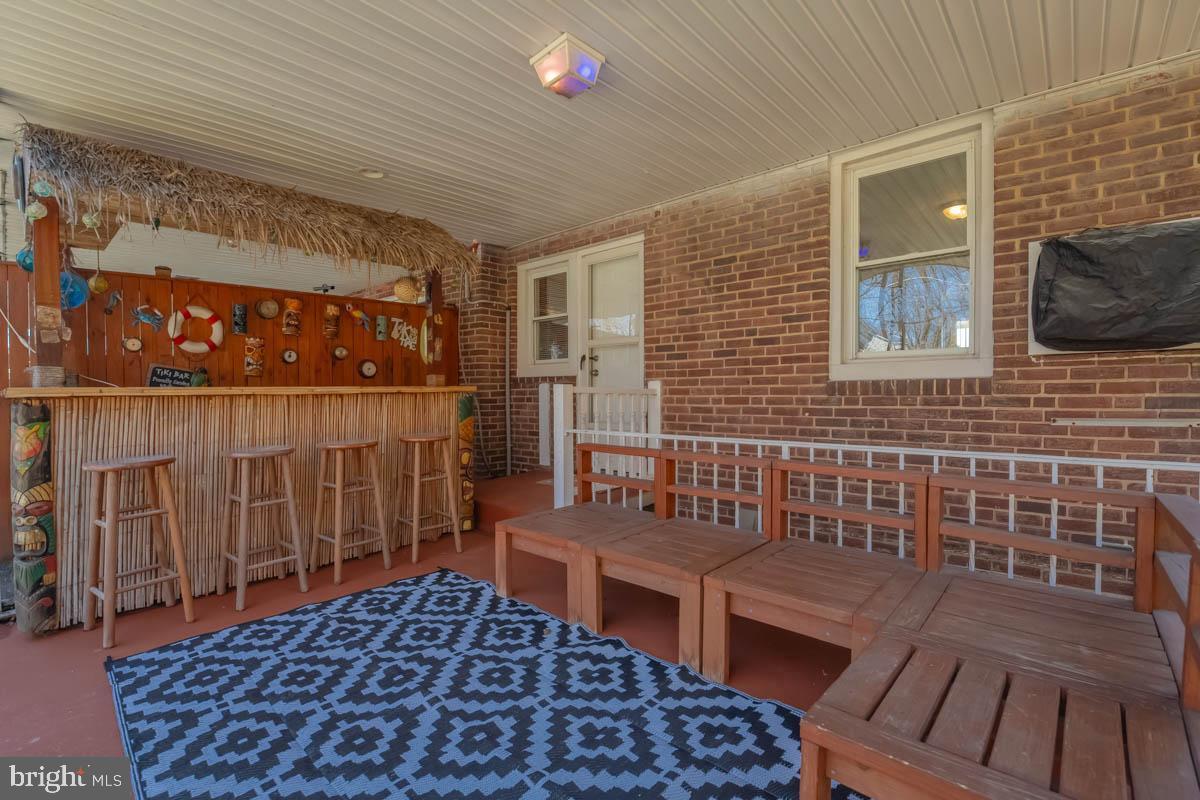 2475 Fairway Baltimore, MD 21222 - Photo 20 of 25 a backyard of a house with seating space