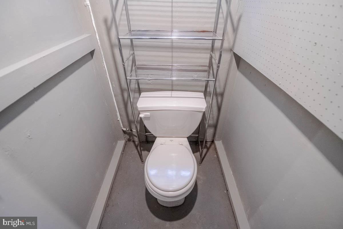 2475 Fairway Baltimore, MD 21222 - Photo 21 of 25 a bathroom with a toilet