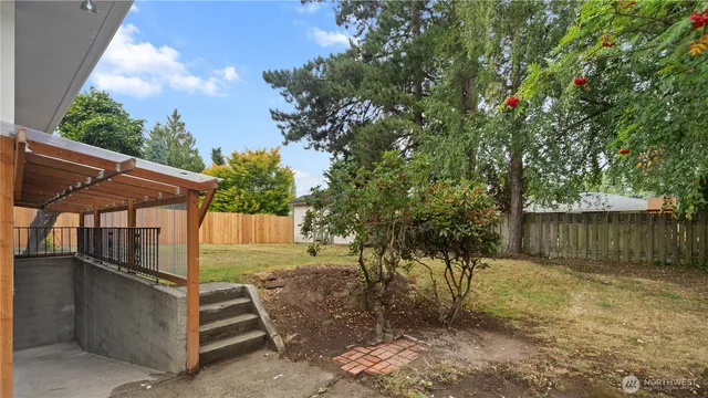 a view of backyard with tree