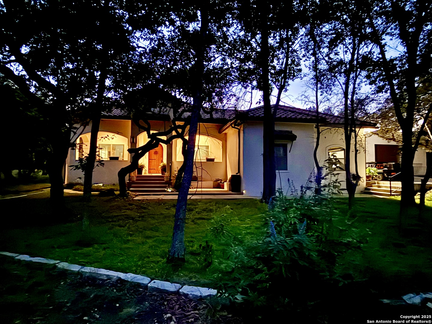 a backyard of a house with lots of green space