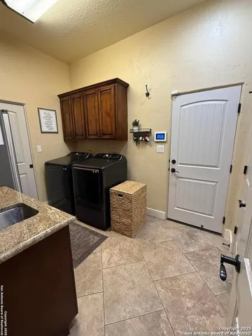 a kitchen with a stove and a refrigerator