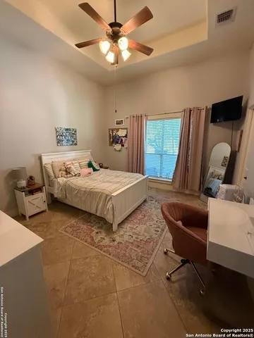 a bathroom with a toilet a sink and a mirror