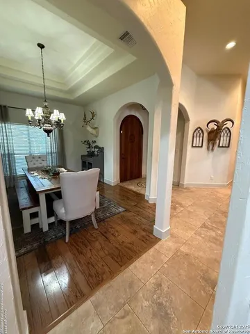 a view of a livingroom with furniture window and wooden floor
