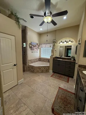 a kitchen with a stove a sink and a refrigerator