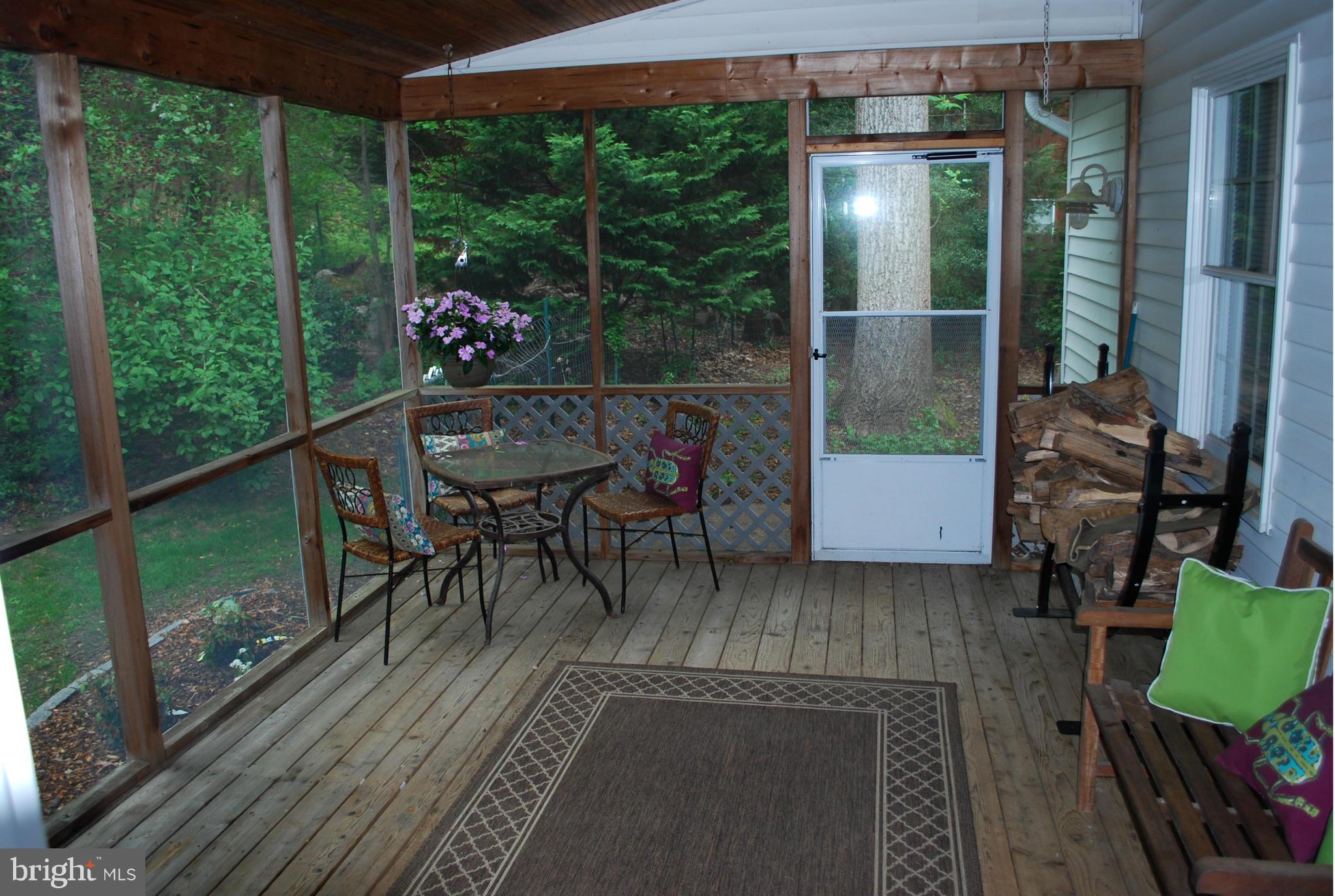 985 St George Barber Road Davidsonville, MD 21035 - Photo 18 of 30 Screened in porch for entertaining