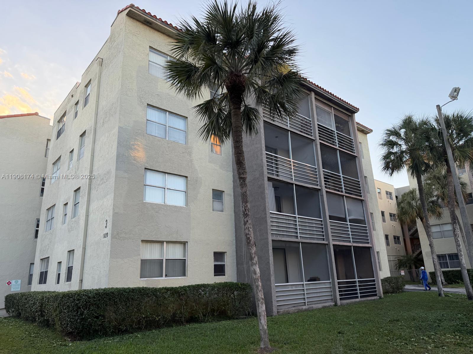 1820 Southwest 81st Avenue, Unit 3107 North Lauderdale, FL 33068 - Photo 18 of 25 a front view of a house with a garden