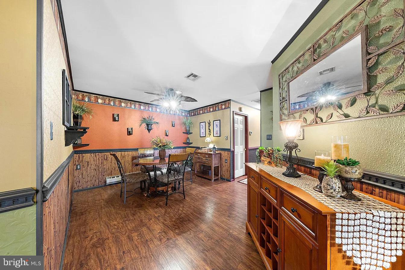 22 Fir Road Manahawkin, NJ 08050 - Photo 9 of 35 a room with furniture and wooden floor