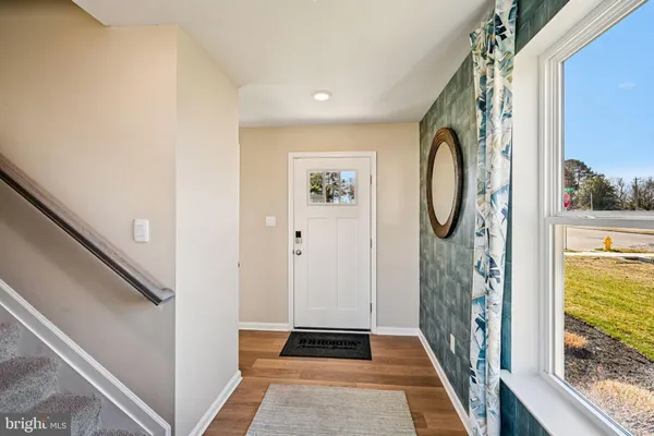a view of a hallway with windows