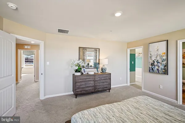 a room with a bed and a window