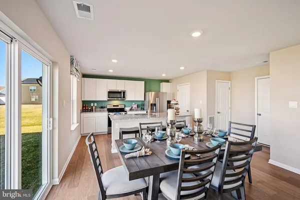 a view of a dining room with furniture
