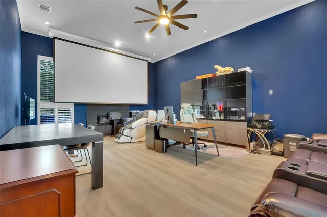 a living room with furniture a rug and a flat screen tv