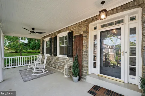 a front view of a house with a porch