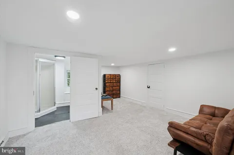 a living room with furniture and a couch