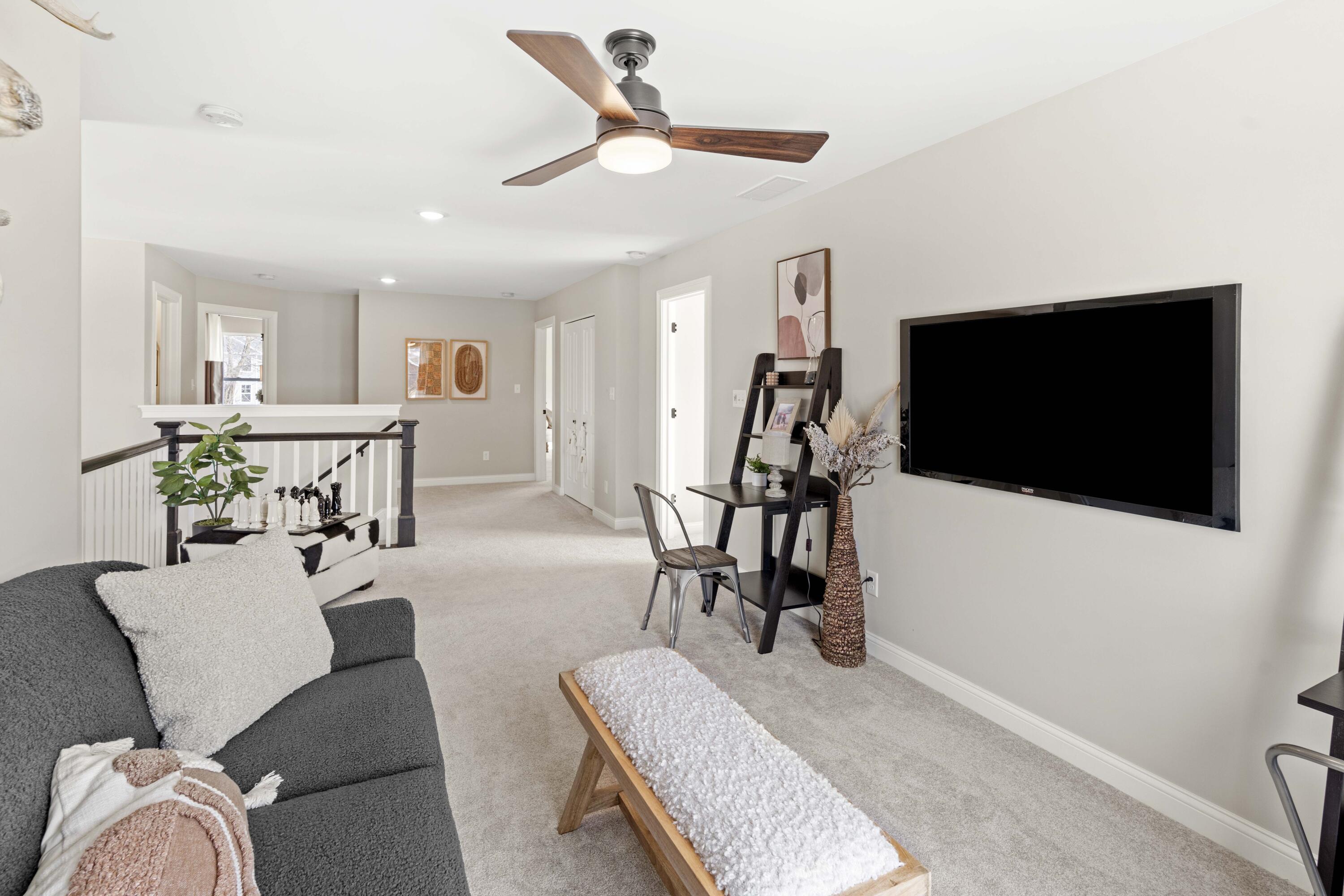10534 California Street Crown Point, IN 46307 - Photo 14 of 23 a living room with furniture and a flat screen tv