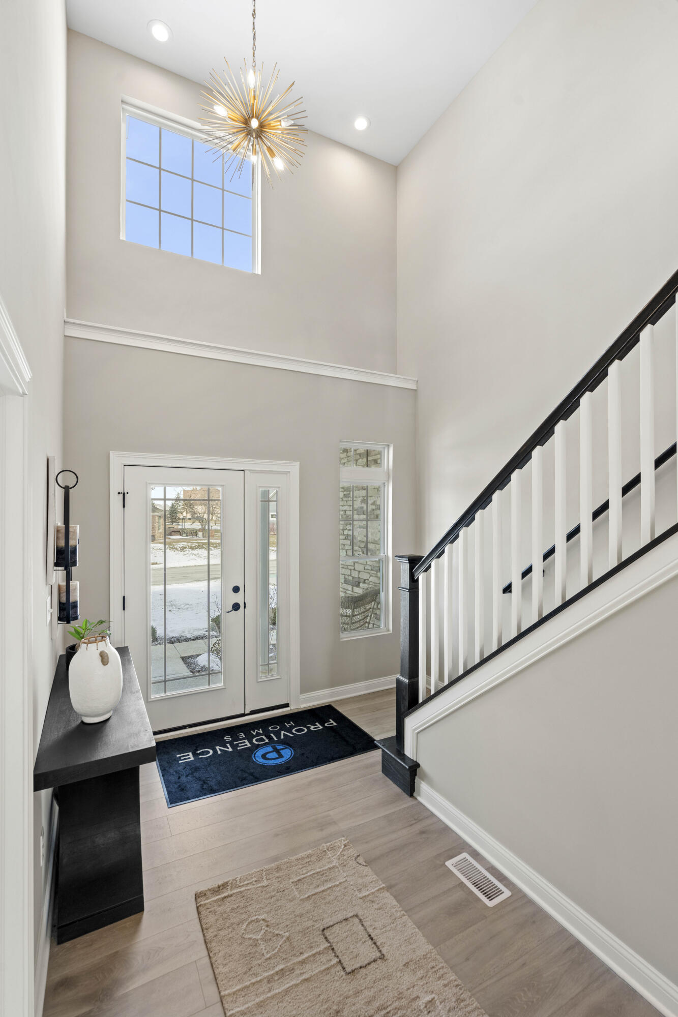 10534 California Street Crown Point, IN 46307 - Photo 2 of 23 a view of an entryway with wooden floor