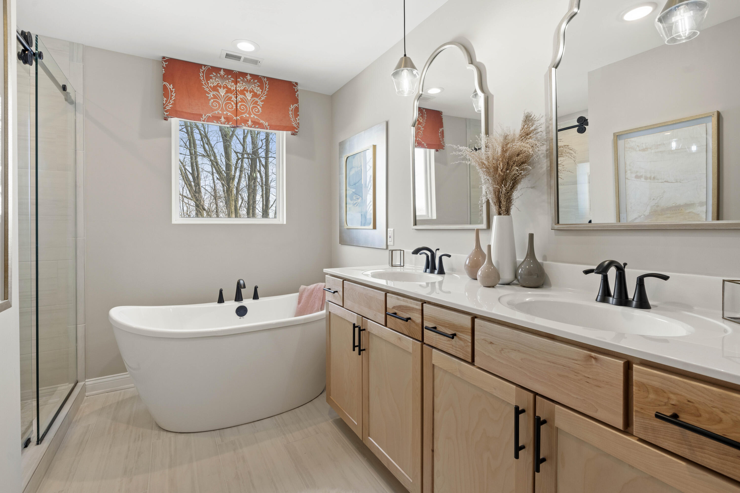 10534 California Street Crown Point, IN 46307 - Photo 22 of 23 a bathroom with a double vanity sink mirror and bathtub