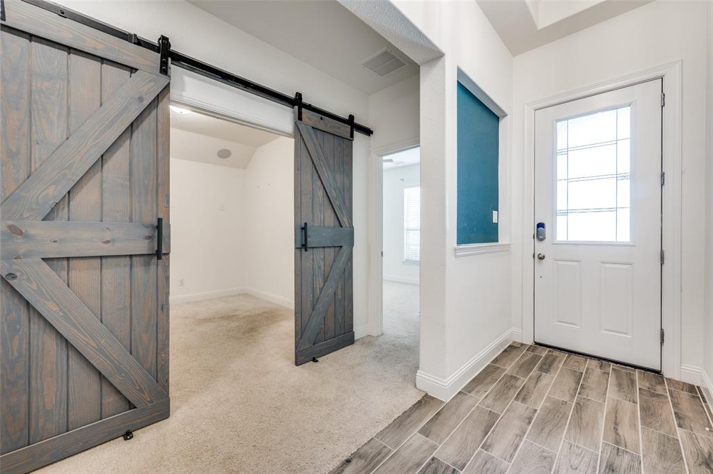 7025 Trailhead Street Little Elm, TX 76227 - Photo 2 of 25 a view of a small space